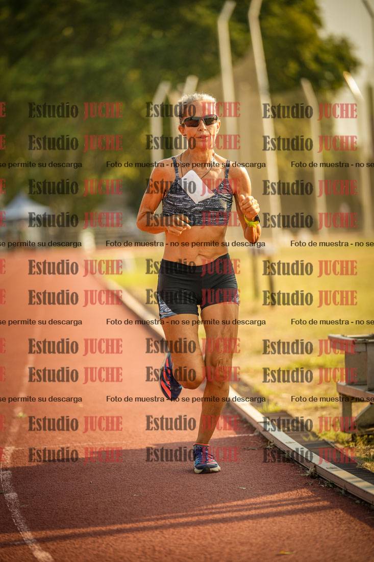 Fotos de los 5000 m llanos de mujeres y varones