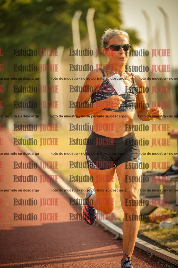 Fotos de los 5000 m llanos de mujeres y varones
