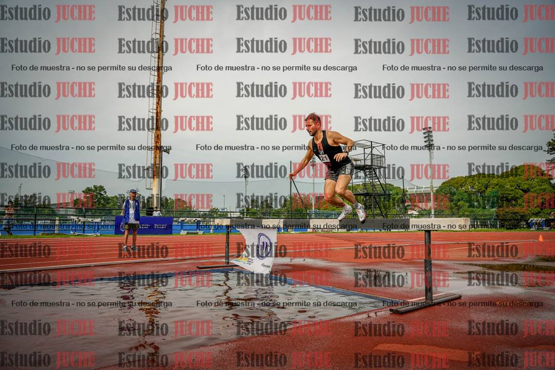 Fotos de los 3000 m con obstáculos de varones
