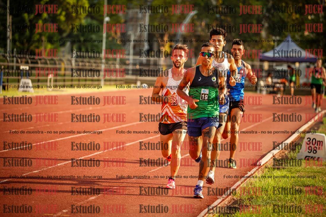 Fotos de los 5000 m llanos de mujeres y varones