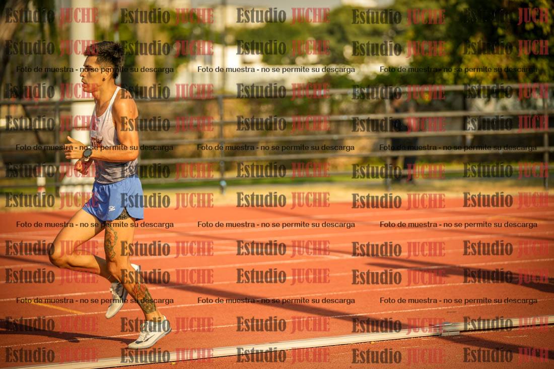 Fotos de los 5000 m llanos de mujeres y varones