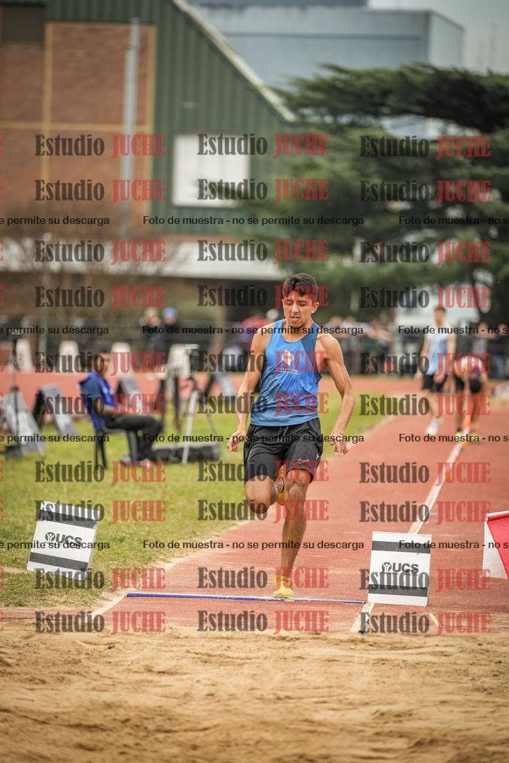 Fotos del salto en largo de varones