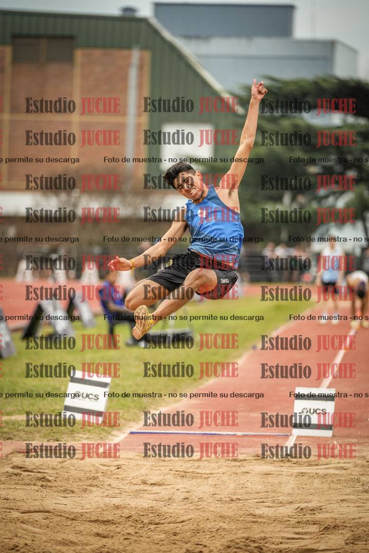 Fotos del salto en largo de varones