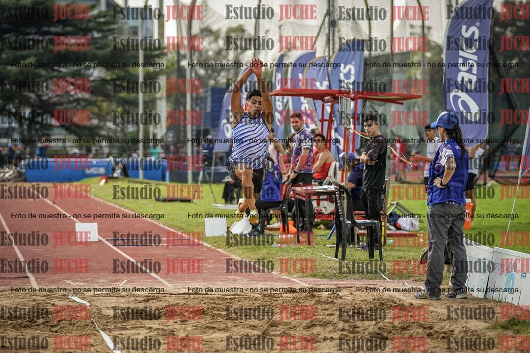 Fotos del salto en largo de varones