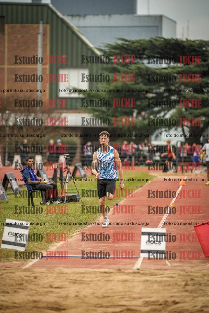 Fotos del salto en largo de varones