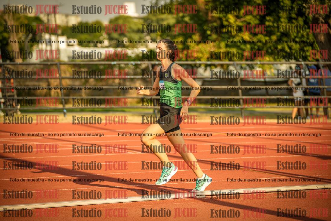 Fotos de los 5000 m llanos de mujeres y varones