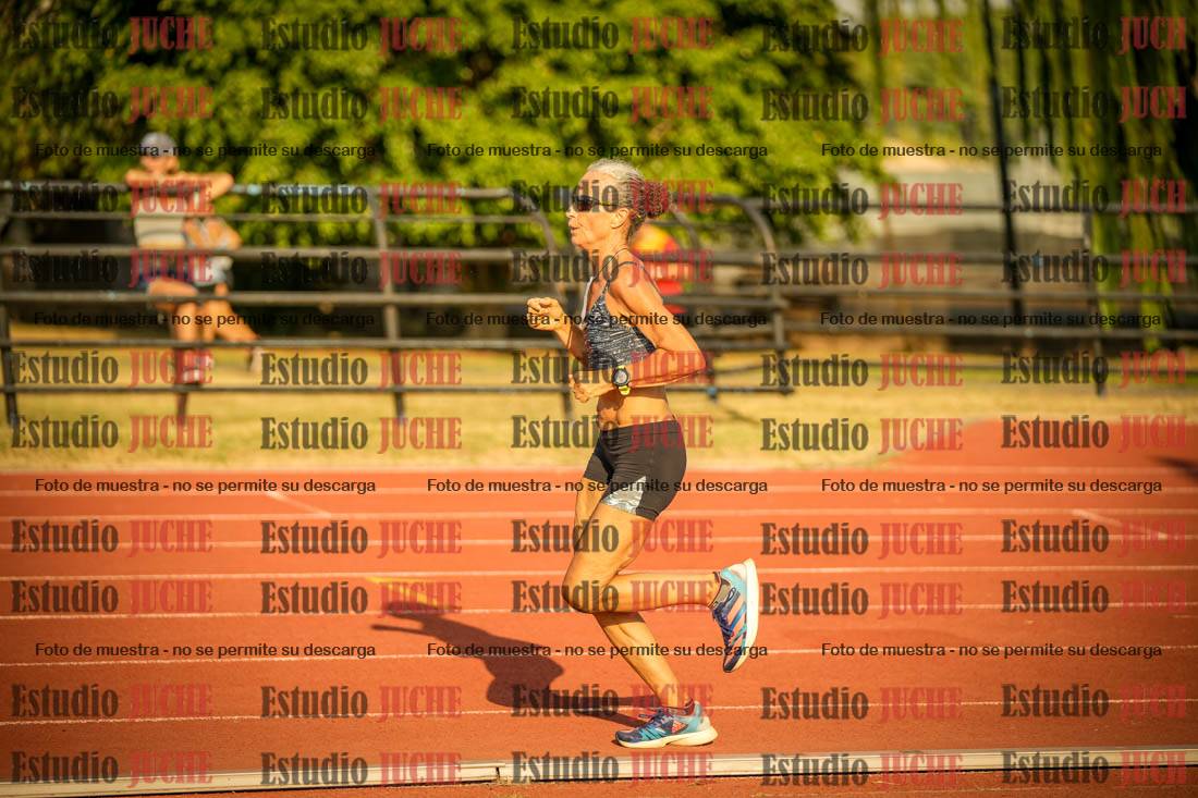 Fotos de los 5000 m llanos de mujeres y varones