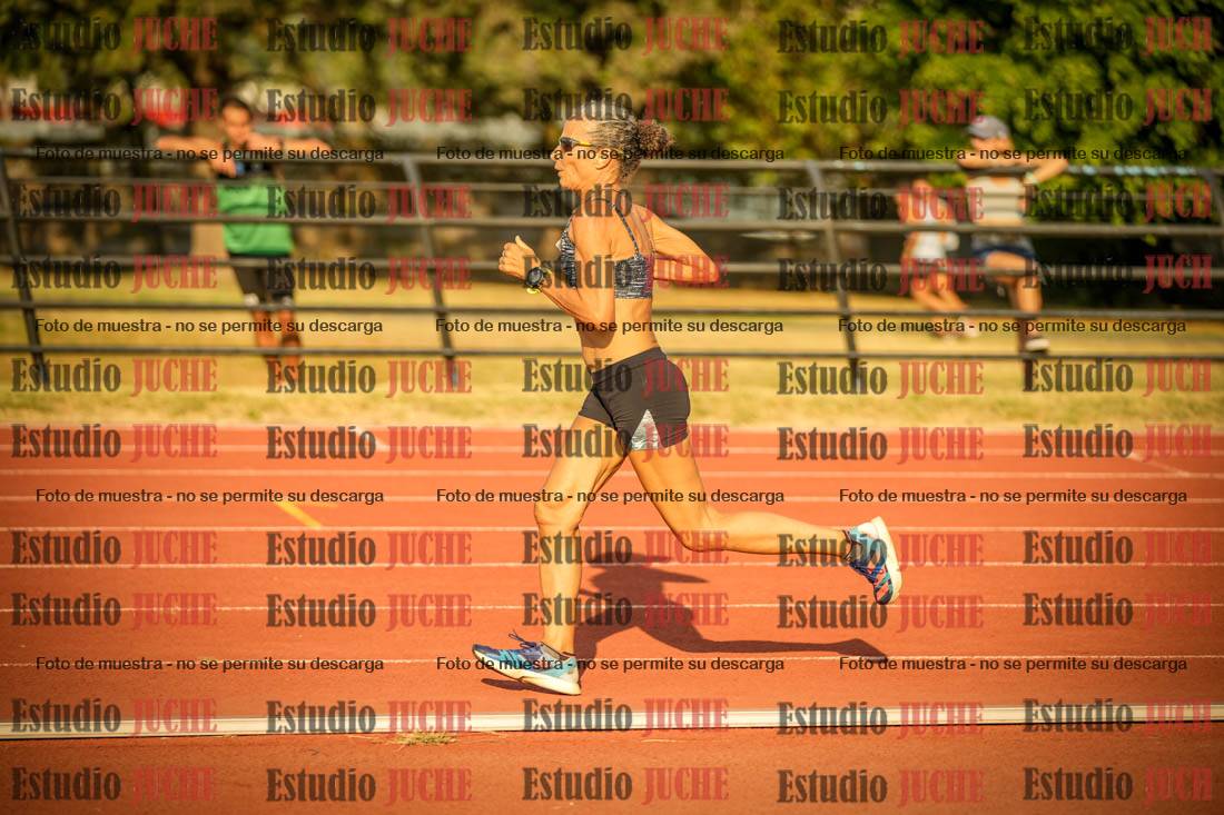 Fotos de los 5000 m llanos de mujeres y varones