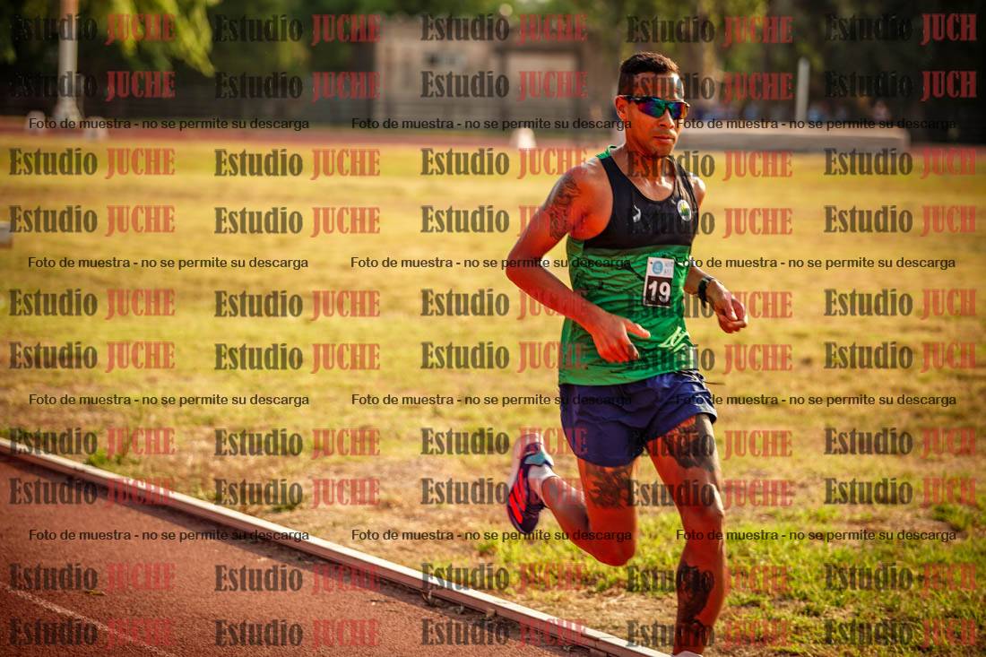 Fotos de los 5000 m llanos de mujeres y varones