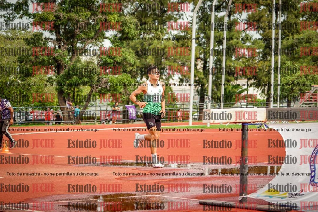 Fotos de los 3000 m con obstáculos de varones