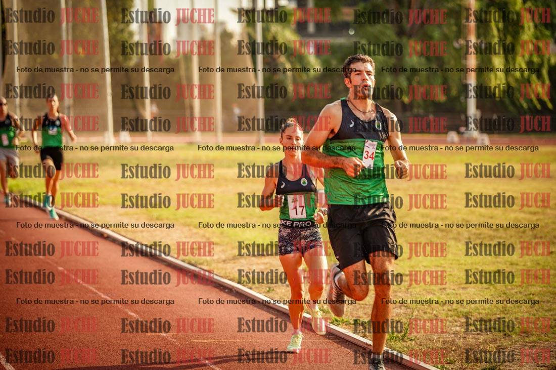 Fotos de los 5000 m llanos de mujeres y varones