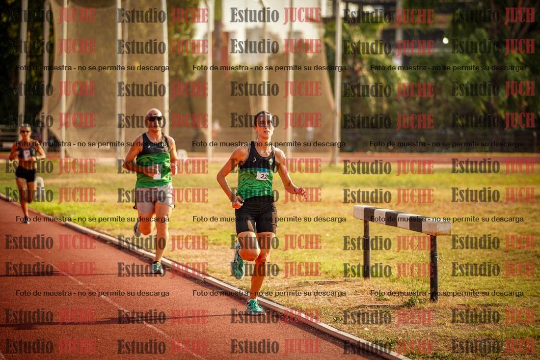 Fotos de los 5000 m llanos de mujeres y varones