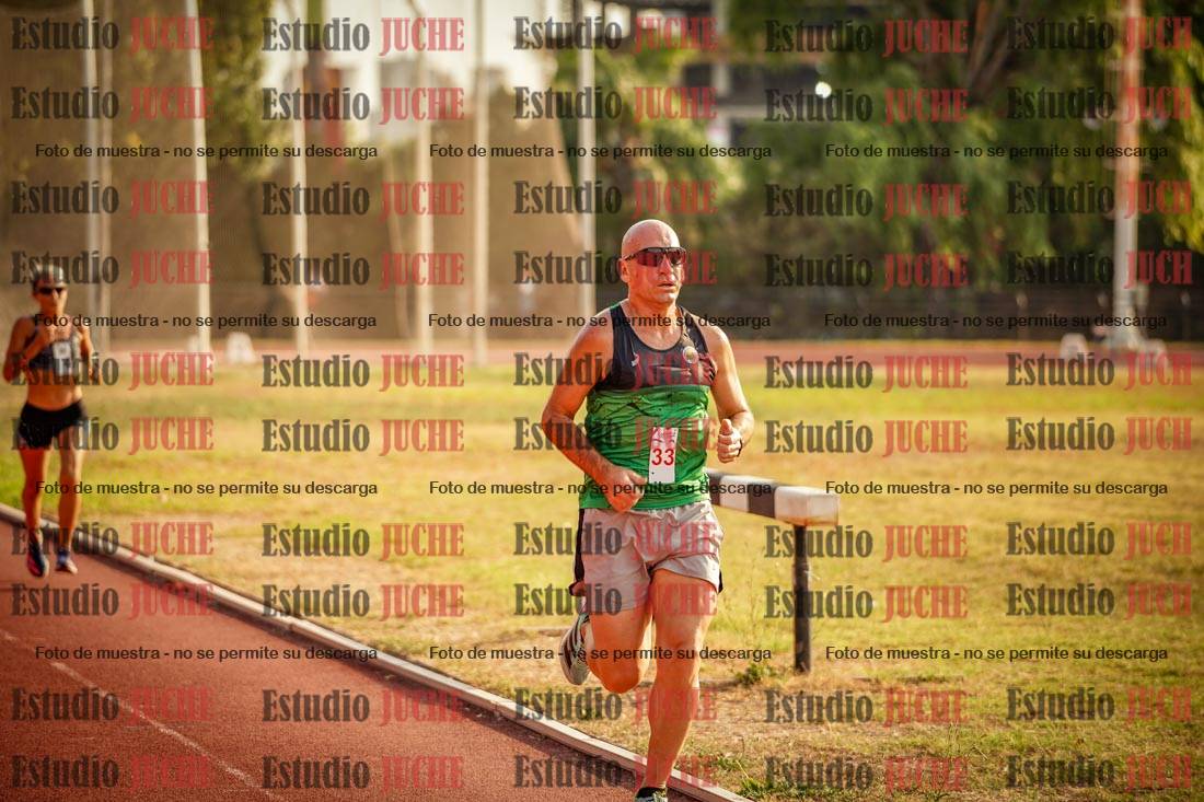 Fotos de los 5000 m llanos de mujeres y varones