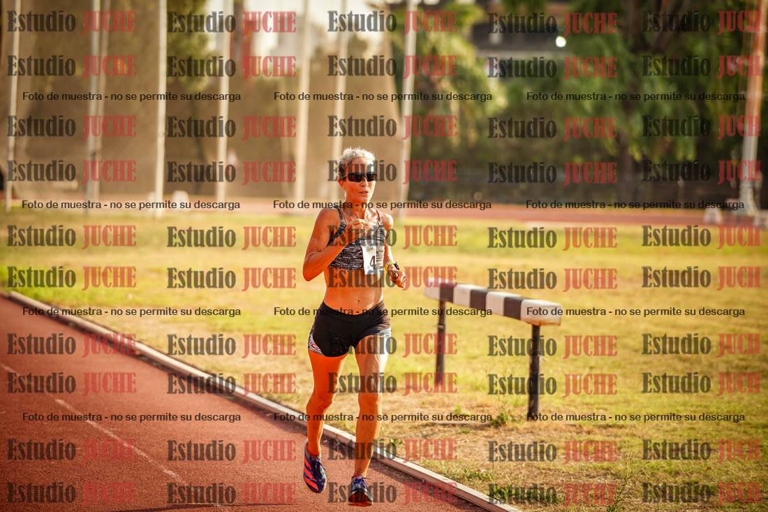 Fotos de los 5000 m llanos de mujeres y varones
