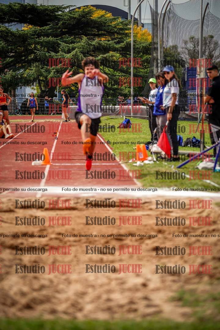 Fotos del salto triple de mujeres y varones