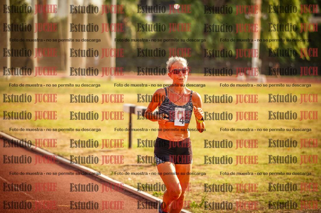 Fotos de los 5000 m llanos de mujeres y varones