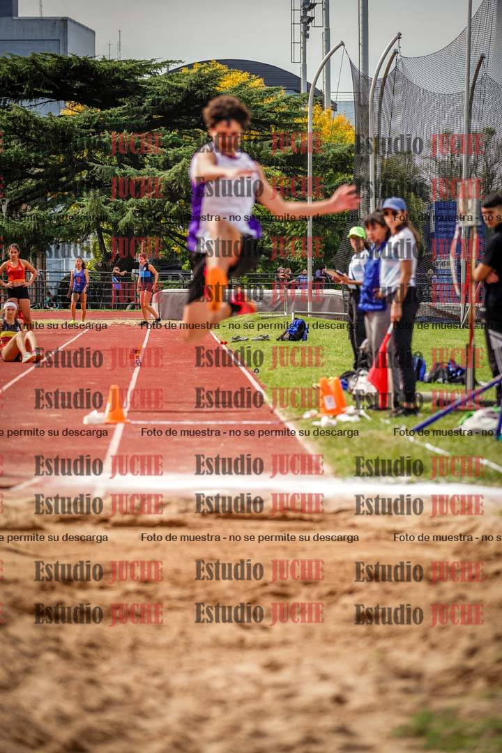 Fotos del salto triple de mujeres y varones