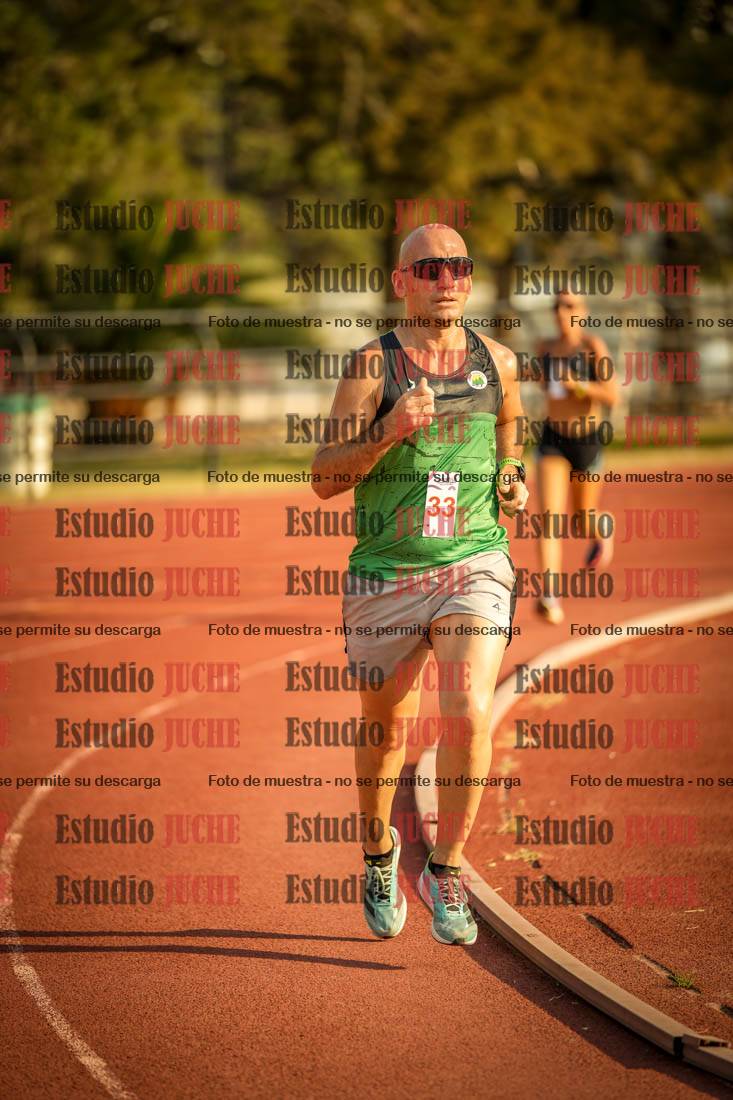 Fotos de los 5000 m llanos de mujeres y varones
