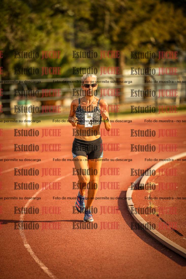 Fotos de los 5000 m llanos de mujeres y varones