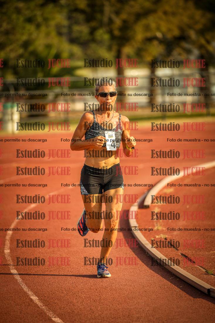 Fotos de los 5000 m llanos de mujeres y varones