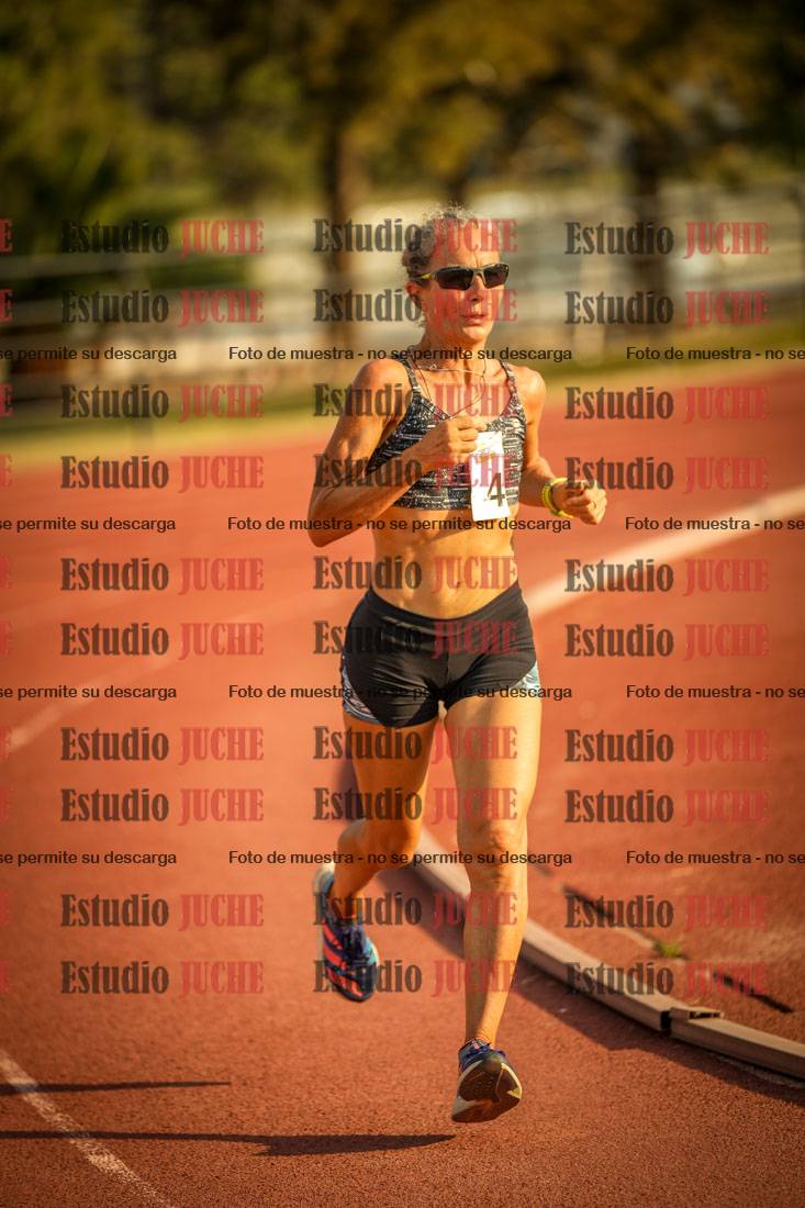 Fotos de los 5000 m llanos de mujeres y varones