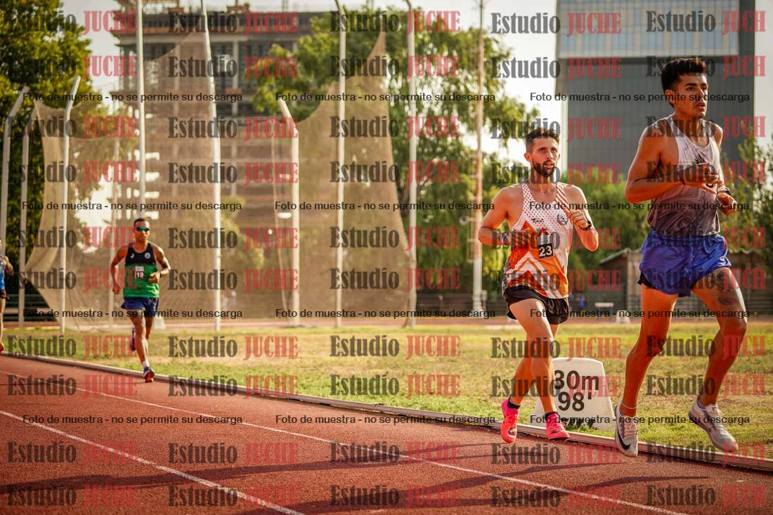 Fotos de los 5000 m llanos de mujeres y varones