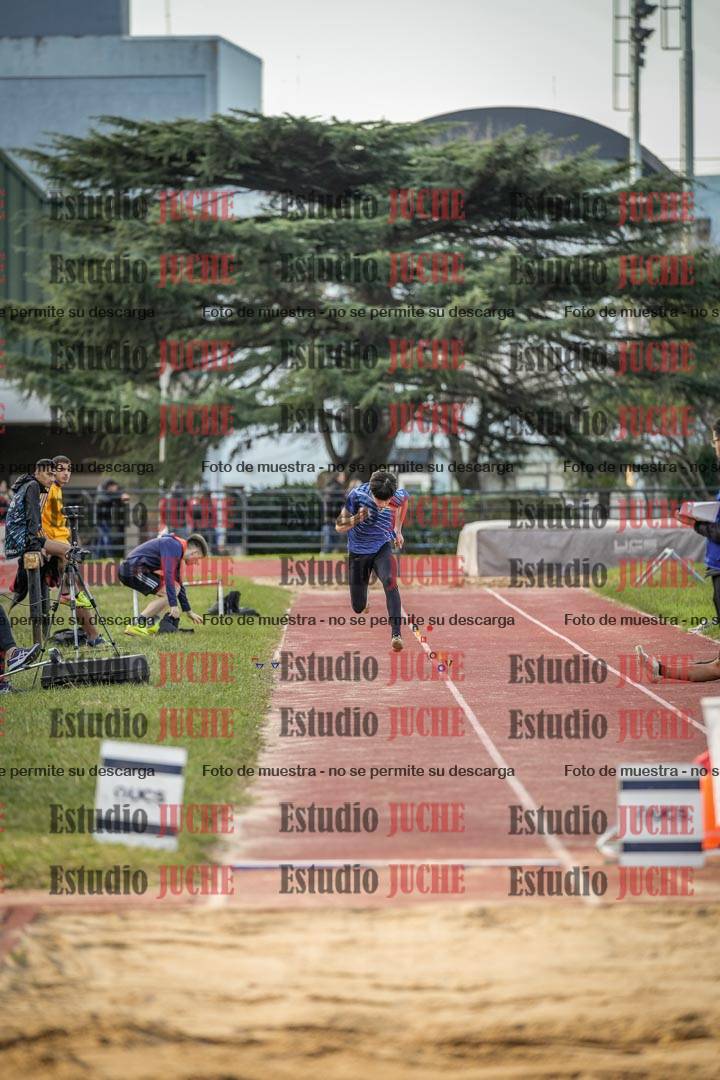 Fotos del salto en largo de varones