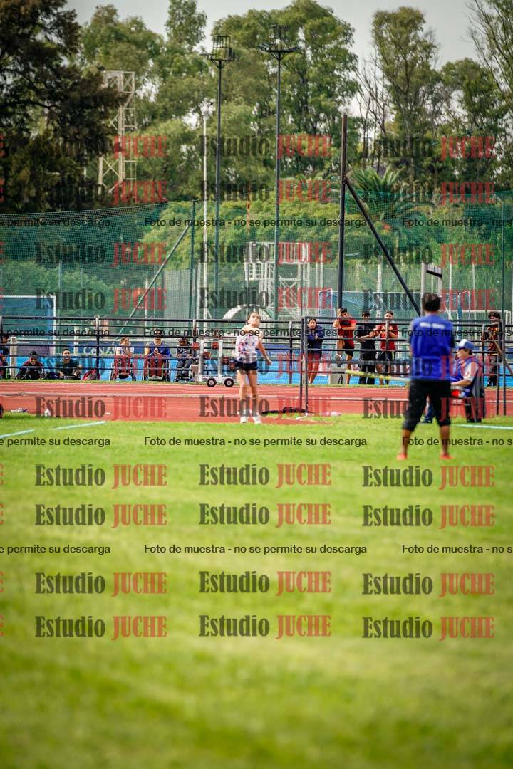 Fotos del salto triple de mujeres y varones