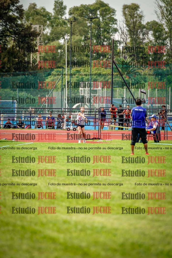 Fotos del salto triple de mujeres y varones
