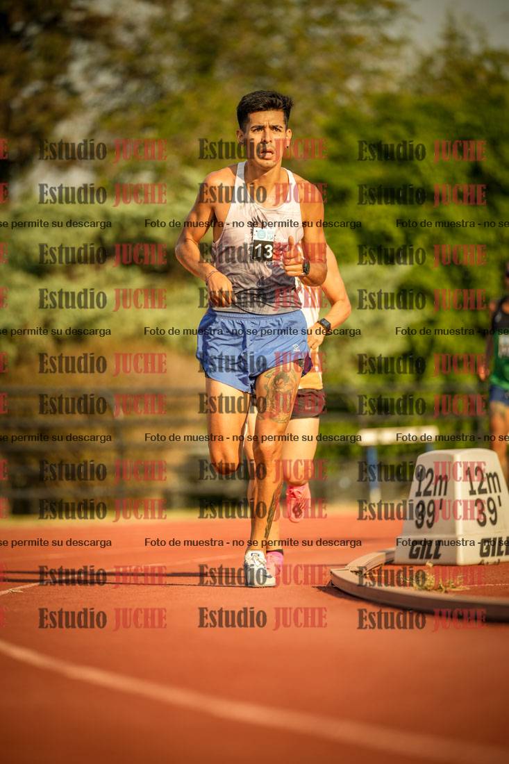 Fotos de los 5000 m llanos de mujeres y varones