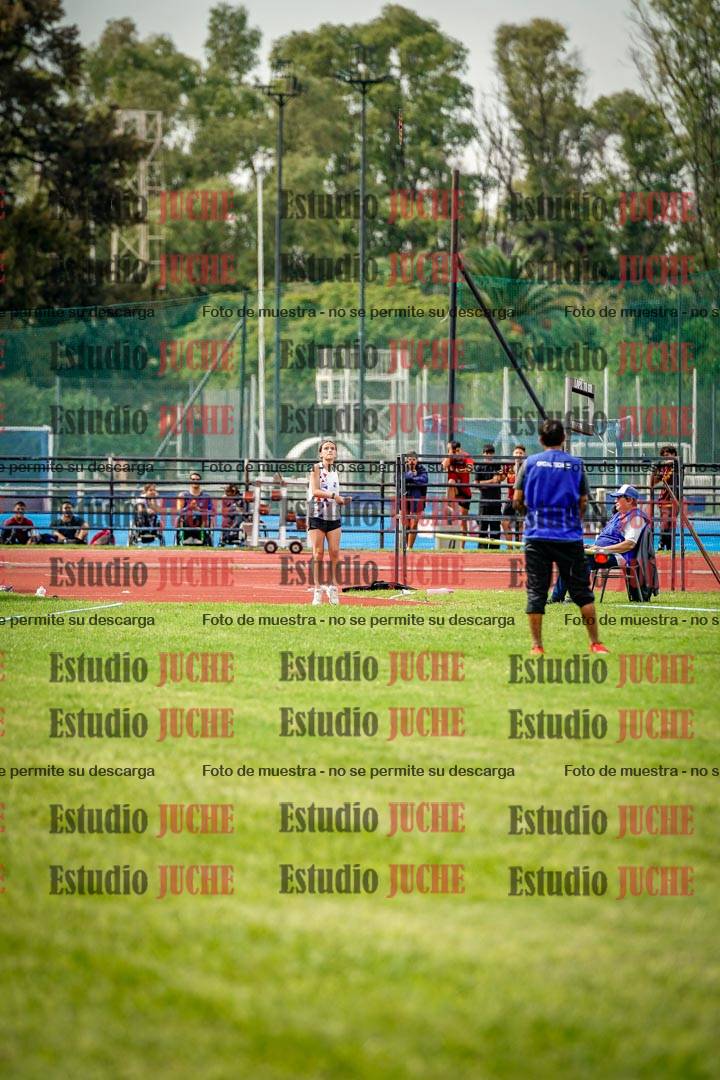 Fotos del salto triple de mujeres y varones