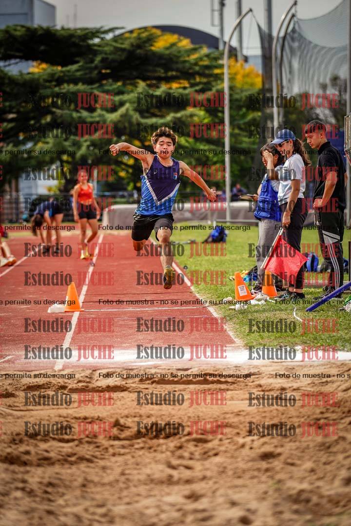 Fotos del salto triple de mujeres y varones