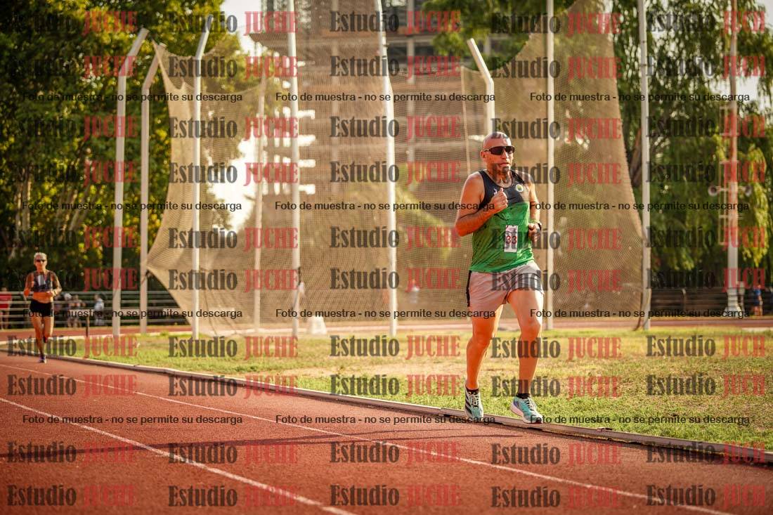 Fotos de los 5000 m llanos de mujeres y varones