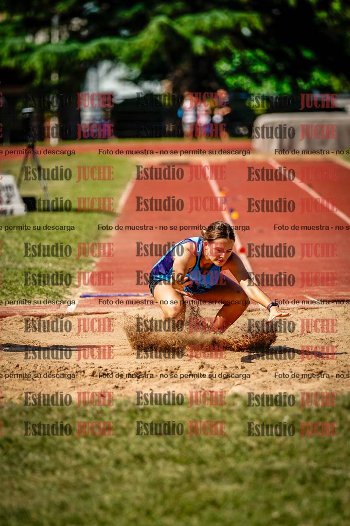 Fotos del salto en largo de mujeres