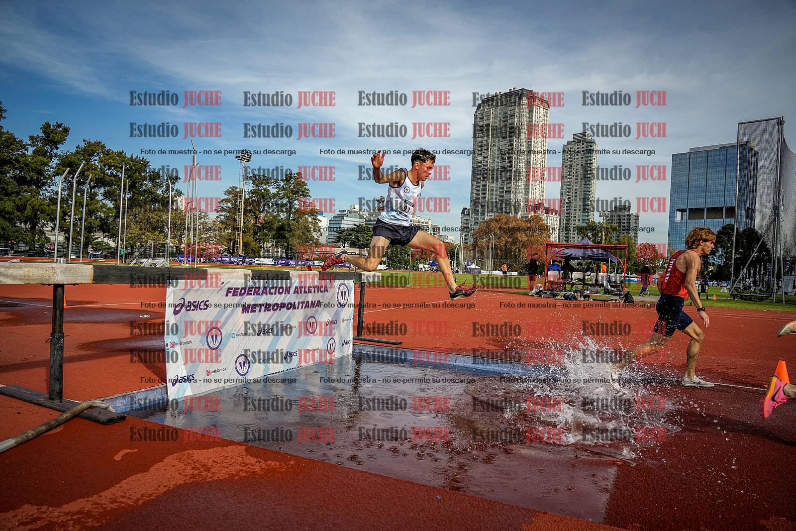 Fotos de los 3000 m con obstáculos de varones