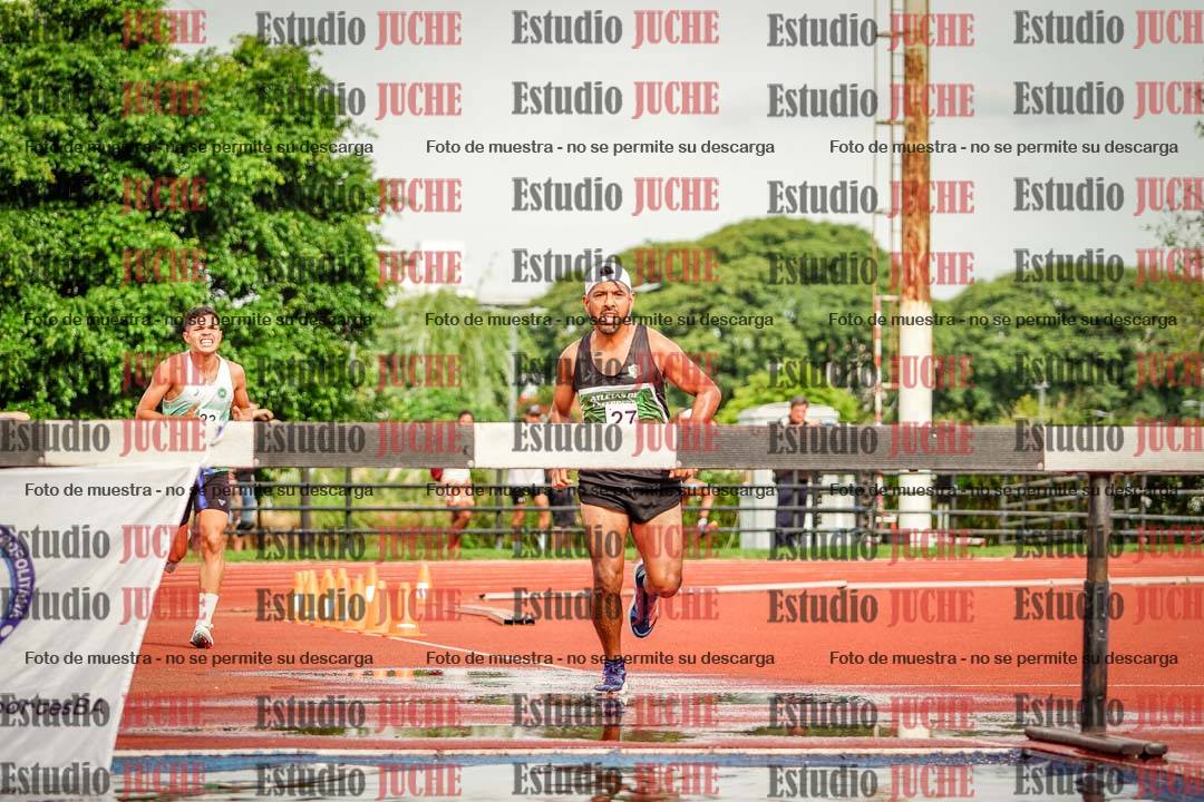 Fotos de los 3000 m con obstáculos de varones