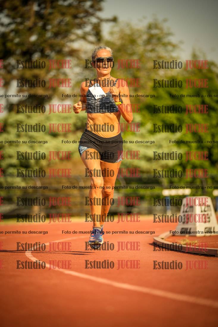 Fotos de los 5000 m llanos de mujeres y varones