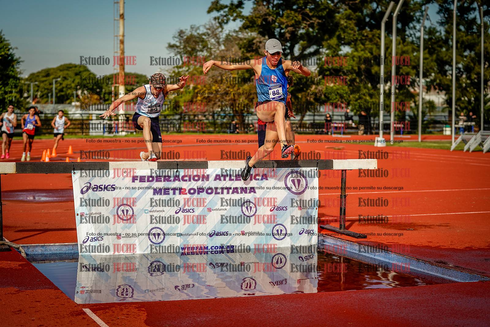 Fotos de los 3000 m con obstáculos de varones