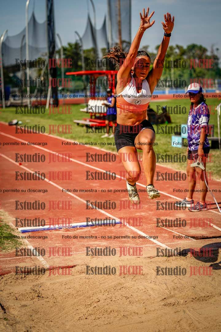 Fotos del salto en largo de mujeres