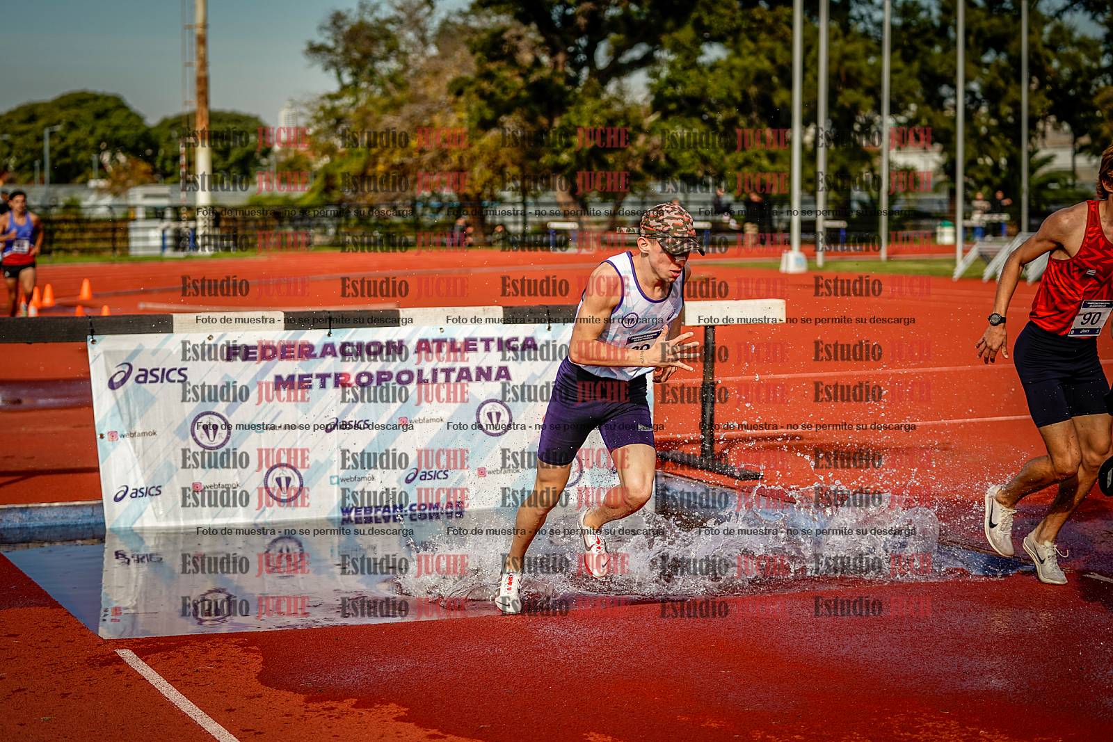 Fotos de los 3000 m con obstáculos de varones