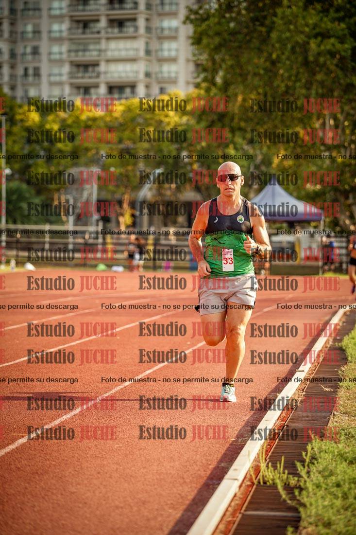 Fotos de los 5000 m llanos de mujeres y varones