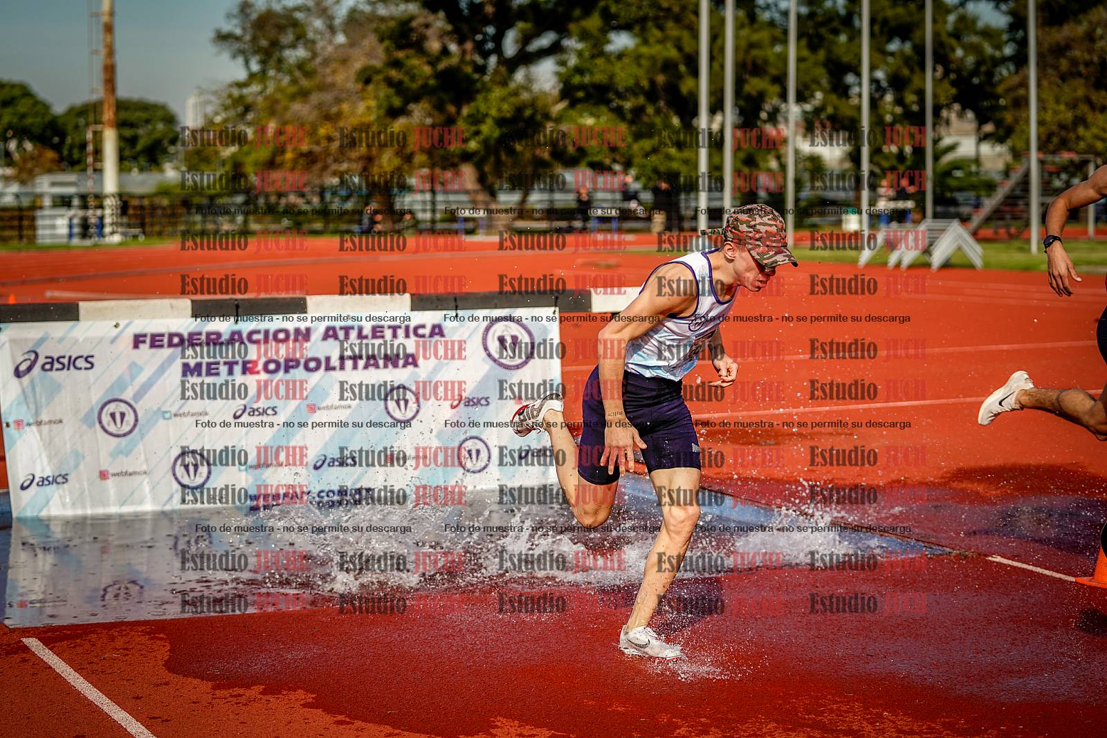 Fotos de los 3000 m con obstáculos de varones