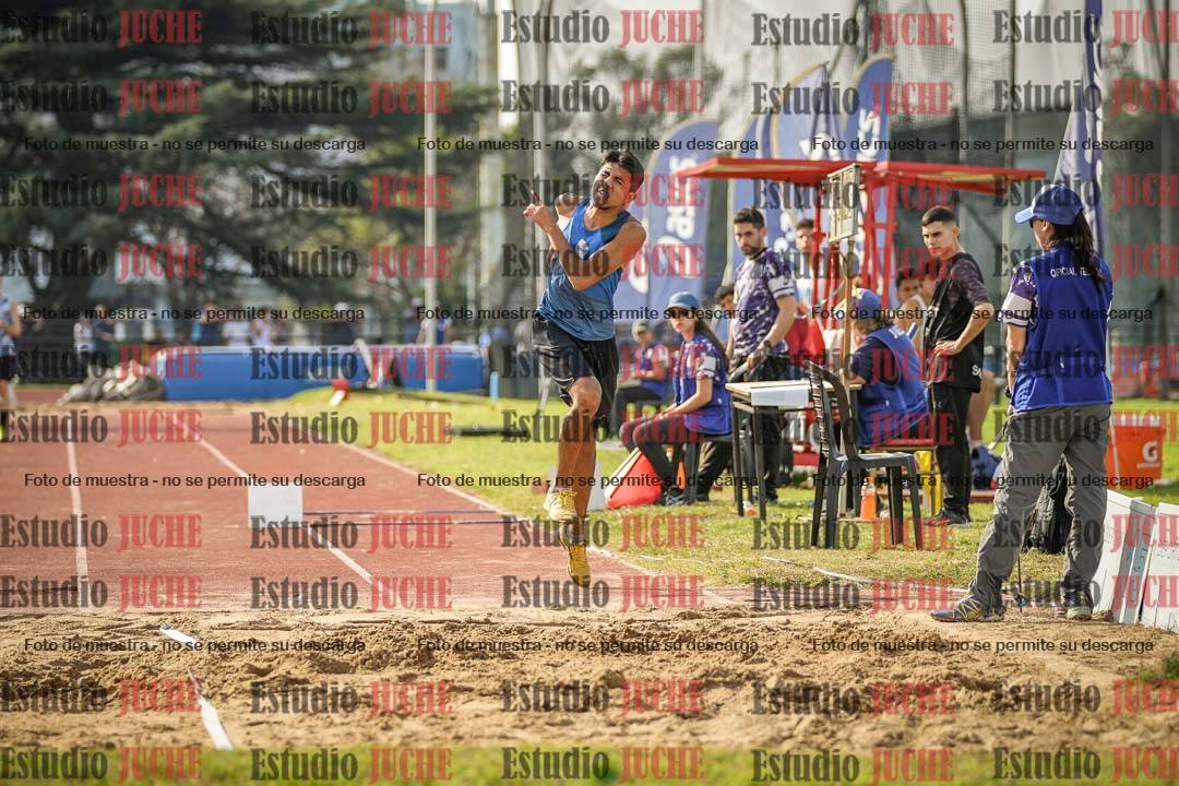 Fotos del salto en largo de varones
