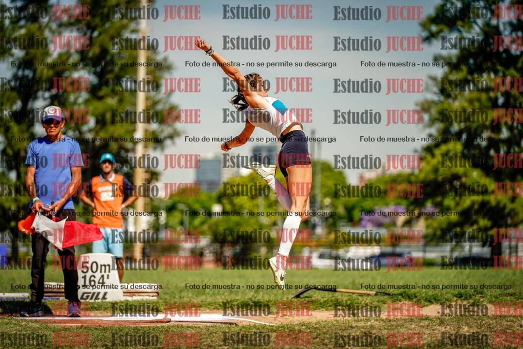 Fotos del salto en largo de mujeres
