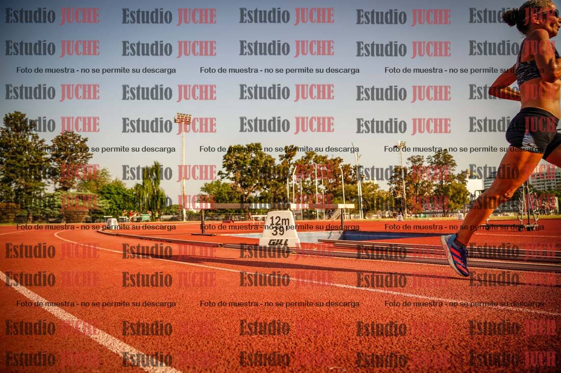 Fotos de los 5000 m llanos de mujeres y varones