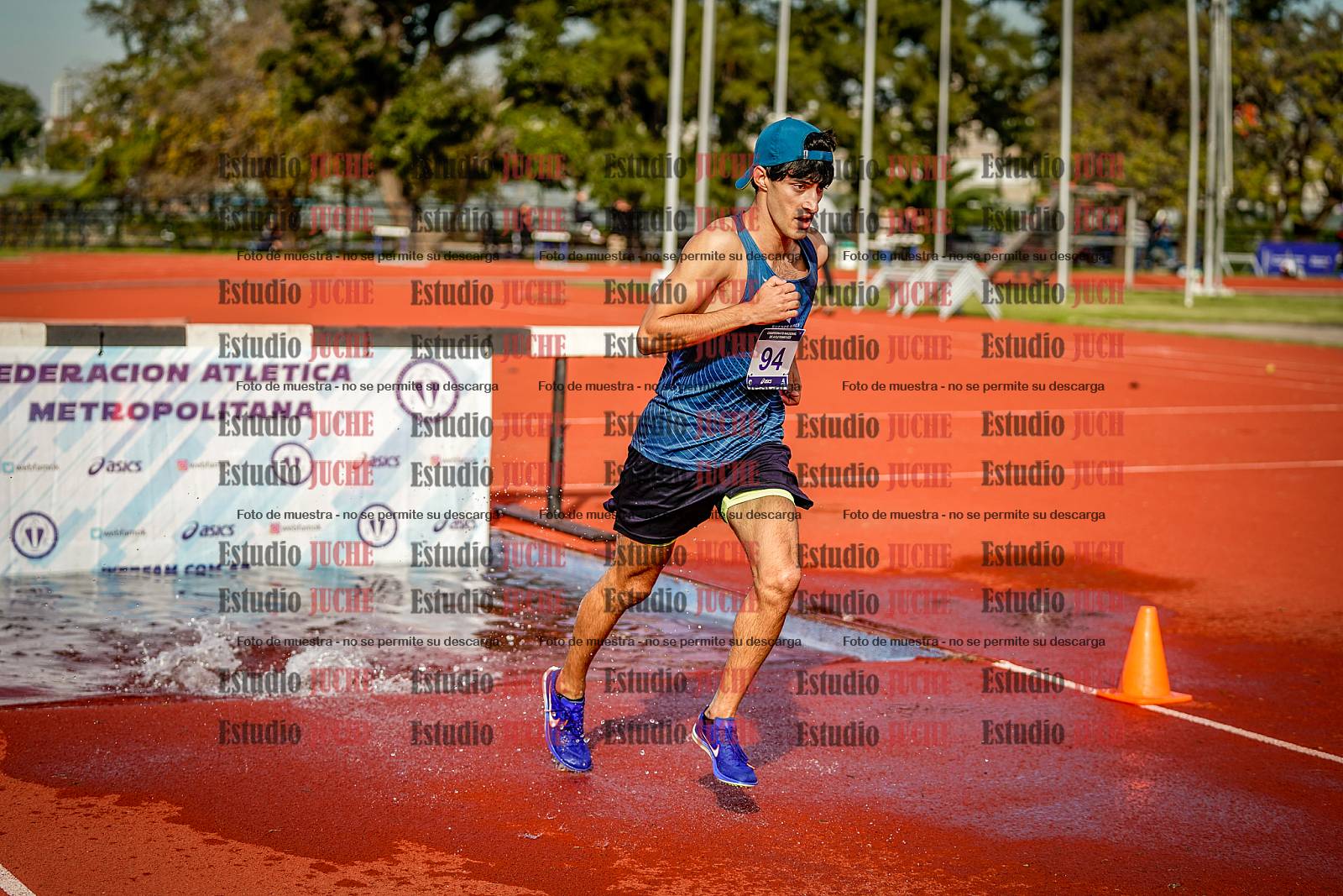 Fotos de los 3000 m con obstáculos de varones