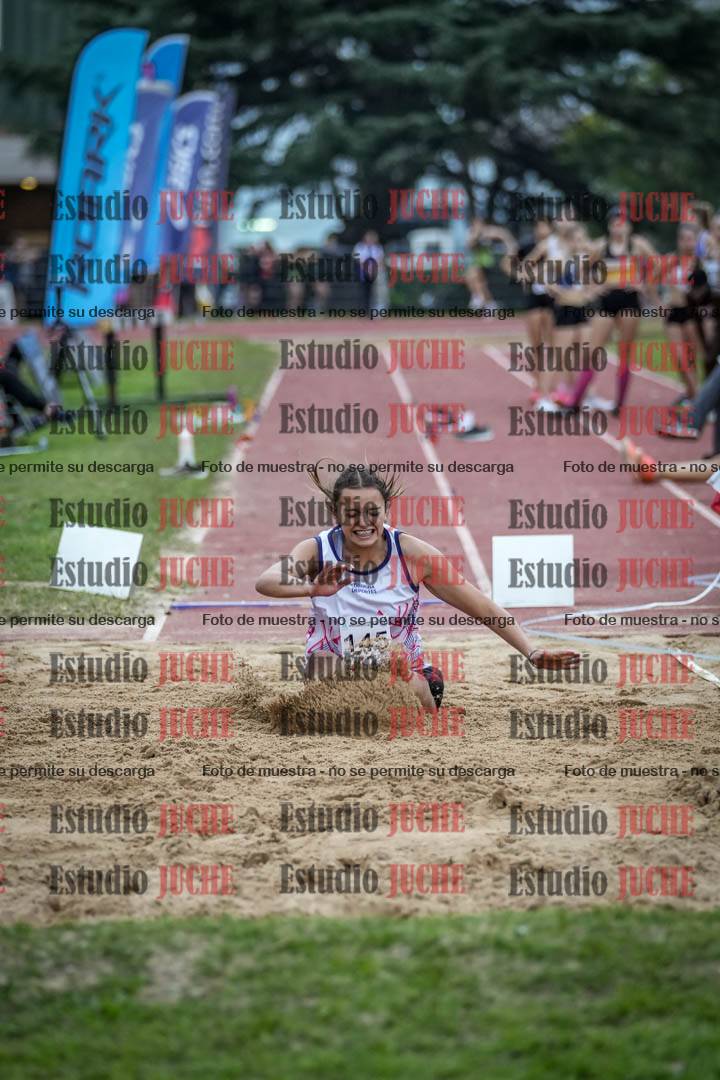 Fotos del salto en largo de mujeres