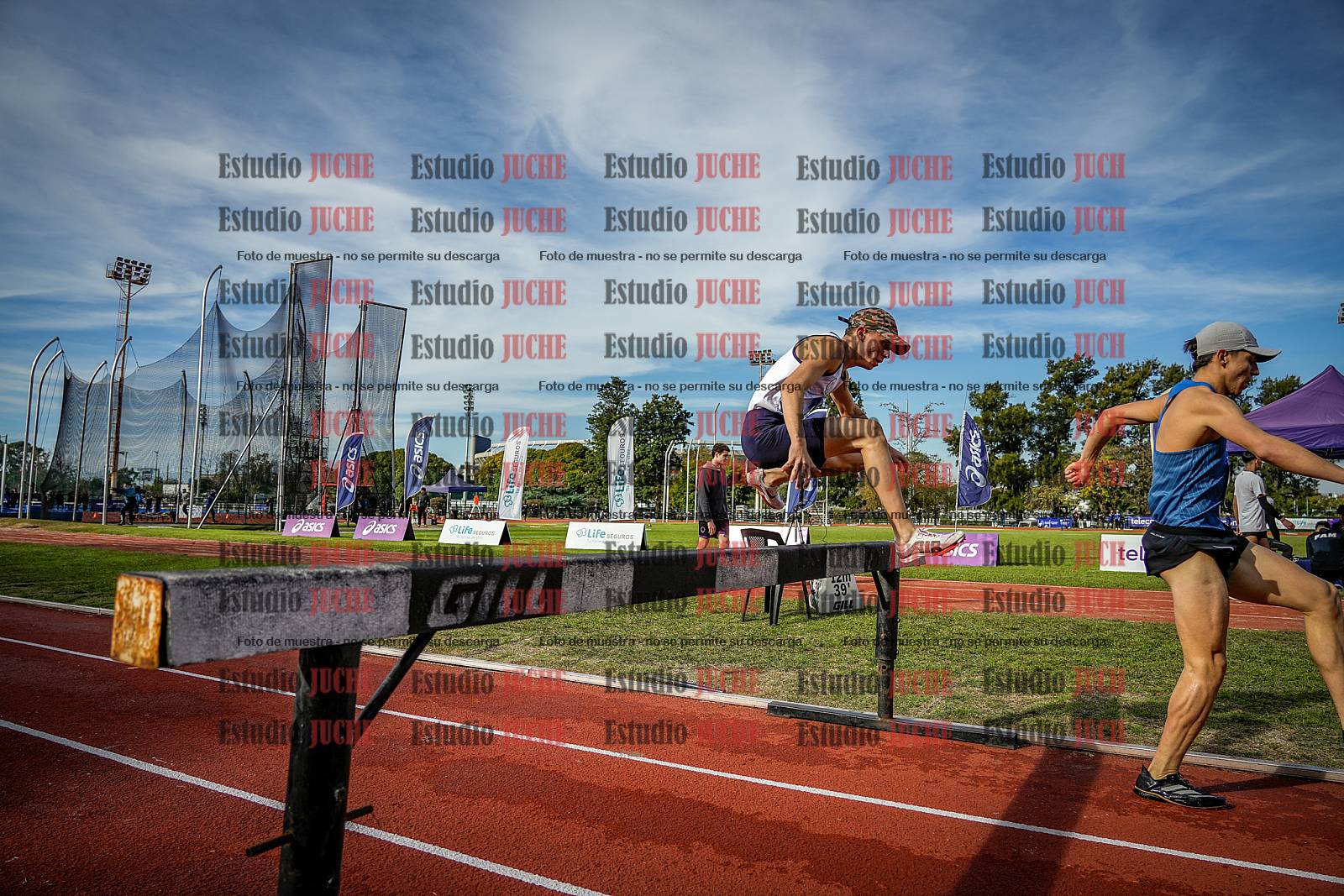 Fotos de los 3000 m con obstáculos de varones