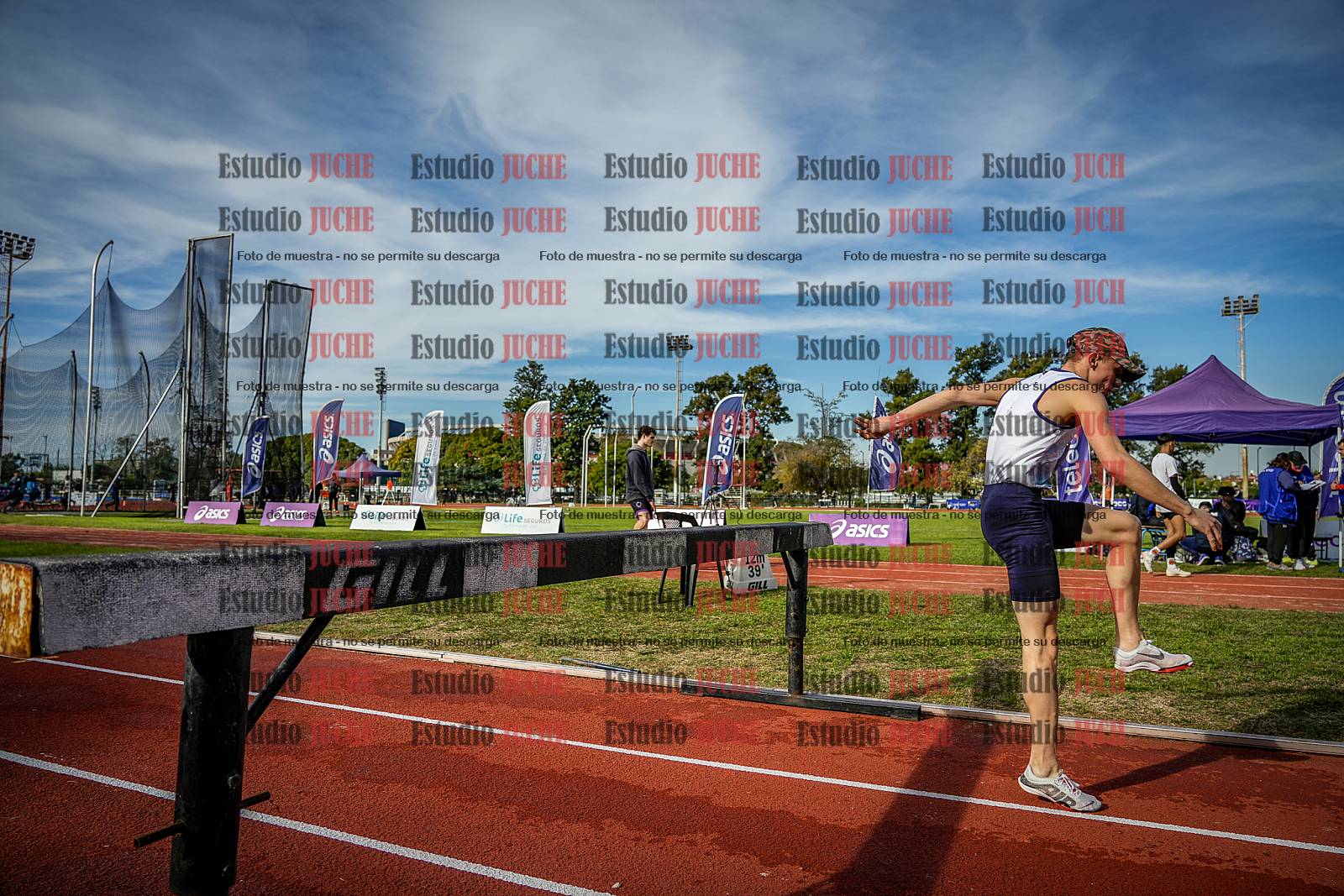 Fotos de los 3000 m con obstáculos de varones
