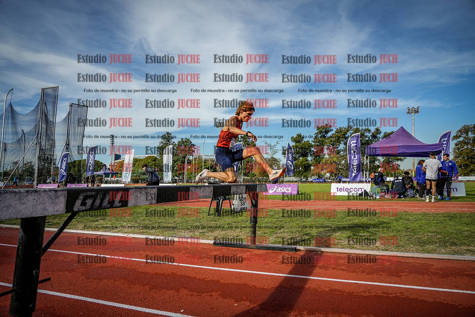 Fotos de los 3000 m con obstáculos de varones